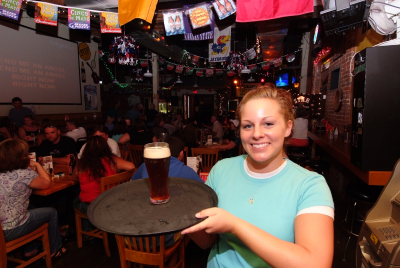Lady serving a beer
