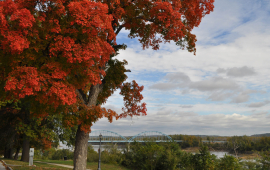 North Esplanade Park's sidewalk overlooks the Missouri River and Centennial Bridge.