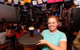 Lady serving a beer