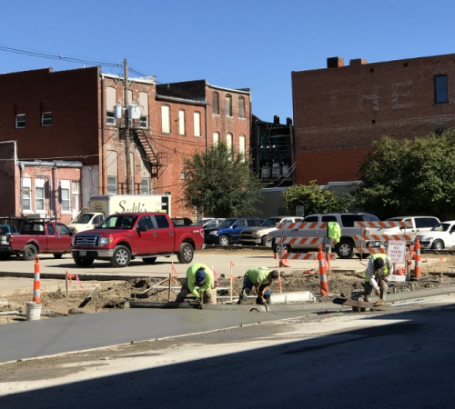 Contractors fill in concrete around a refurbished parking lot at Sixth and Cherokee streets in downtown Leavenworth in 2018.