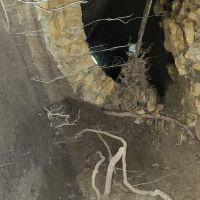 View looking up from collapsed arch