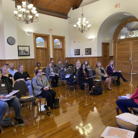 Penny Holler Assistant City Manager speaking to a crowd of business professionals at the Riverfront Community Center Oct. 17 
