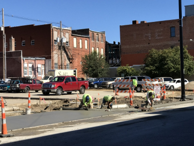 Contractors fill in concrete around a refurbished parking lot at Sixth and Cherokee streets in downtown Leavenworth in 2018.