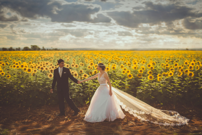 Wedding by a field of sunflowers